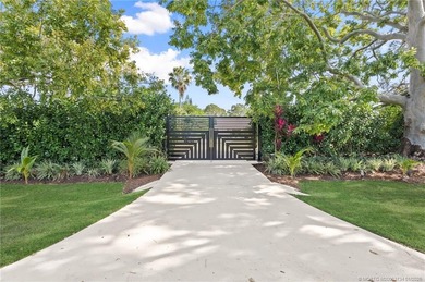The Ultimate in Living Enjoyment! Set on 3.47 acres in the - photo 1