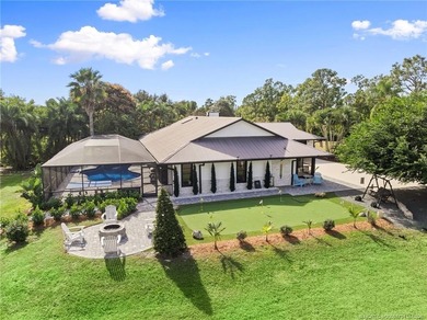 The Ultimate in Living Enjoyment! Set on 3.47 acres in the - photo 3