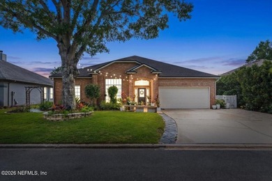 Set on a peaceful waterfront lot in the gated community of The - photo 9