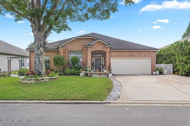 Set on a peaceful waterfront lot in the gated community of The - photo 10