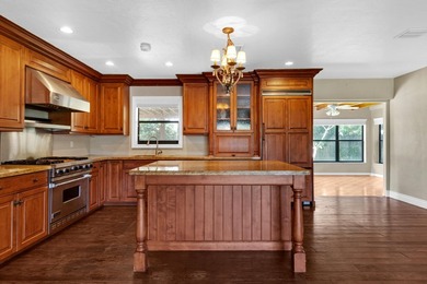 Welcome to this charming 3-bedroom, 2-bath home in the desirable - photo 1