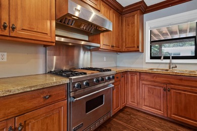 Welcome to this charming 3-bedroom, 2-bath home in the desirable - photo 7