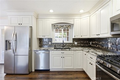 WOW! This beautifully maintained 3-bedroom, 2-bathroom home is - photo 13