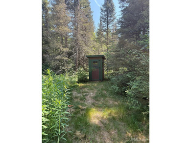 This 120-acre property is situated within the Ottawa National - photo 13