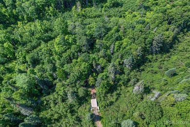 This 120-acre property is situated within the Ottawa National - photo 15