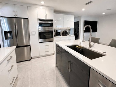 REMODELED 3-bedroom, 2-bath lakefront POOL home on 9500+ sq ft - photo 7