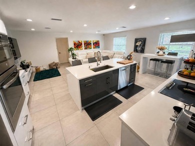 REMODELED 3-bedroom, 2-bath lakefront POOL home on 9500+ sq ft - photo 9