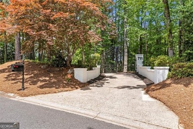 Tucked away on a quiet cul-de-sac in the prestigious Windward - photo 2