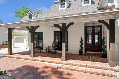 Tucked away on a quiet cul-de-sac in the prestigious Windward - photo 4