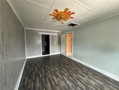 Three bedroom two bath home in Village On The Green subdivision - photo 18