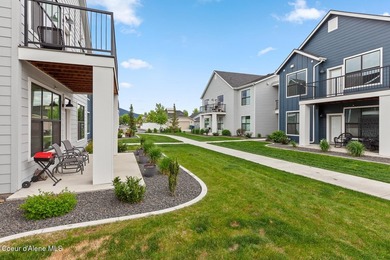Welcome to low-maintenance living in the highly sought-after - photo 22