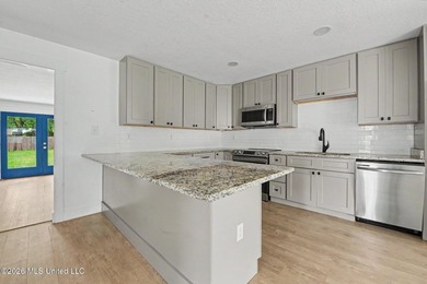 Absolutely adorable recently renovated home in Golf Cart - photo 7