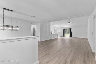 Welcome home to this beautifully renovated 4-bedroom, 2-bath - photo 8