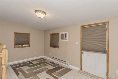 Welcome to 42 Larch Street in Hicksville, a well-maintained cape - photo 12
