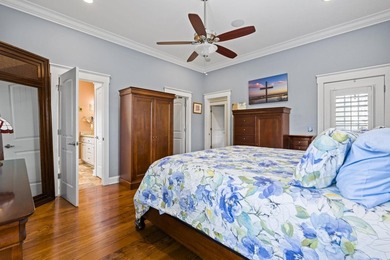 Four-bedroom, three-bathroom, elevated coastal home with a - photo 17