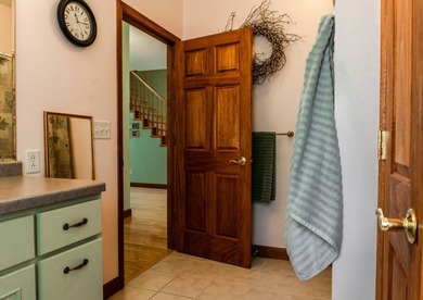 Wake up to peaceful lake views from nearly every room in this - photo 20