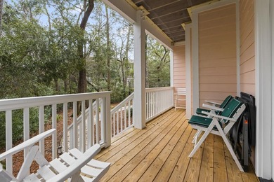 Four-bedroom, three-bathroom, elevated coastal home with a - photo 26