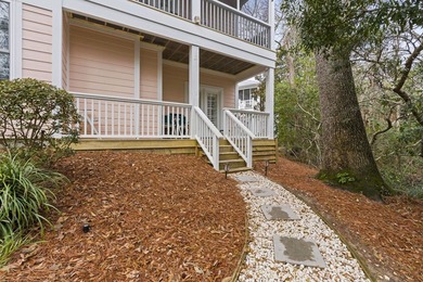 Four-bedroom, three-bathroom, elevated coastal home with a - photo 27