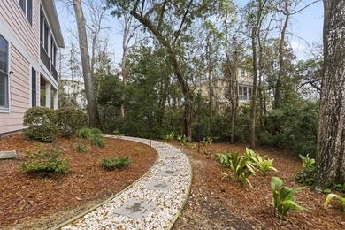 Four-bedroom, three-bathroom, elevated coastal home with a - photo 28