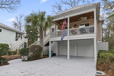 Four-bedroom, three-bathroom, elevated coastal home with a - photo 38