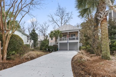 Four-bedroom, three-bathroom, elevated coastal home with a - photo 39