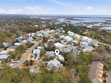 Four-bedroom, three-bathroom, elevated coastal home with a - photo 40