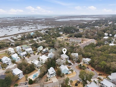 Four-bedroom, three-bathroom, elevated coastal home with a - photo 43