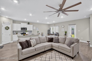 Some homes you tour. This one you settle into. The open layout - photo 4