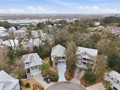 Four-bedroom, three-bathroom, elevated coastal home with a - photo 45