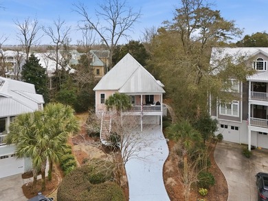 Four-bedroom, three-bathroom, elevated coastal home with a - photo 46