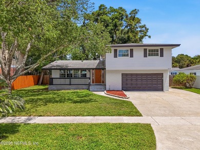 No HOA!!! Beautifully renovated with blends modern luxury with - photo 1