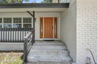 No HOA!!! Beautifully renovated with blends modern luxury with - photo 3