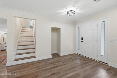 No HOA!!! Beautifully renovated with blends modern luxury with - photo 5