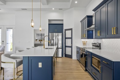 Beautiful model home situated on a desirable corner lot in the - photo 17