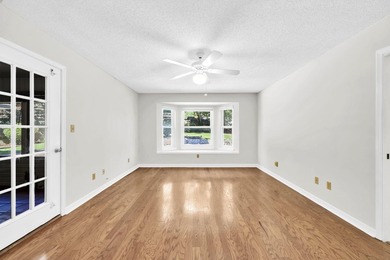 Rarely available in Niceville, this single-level pool and spa - photo 27
