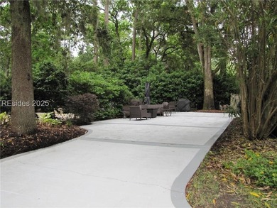 Own a desirable stamped concrete lot and location around the - photo 3