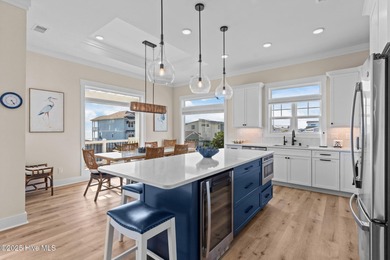 Experience the pinnacle of refined living in this newly