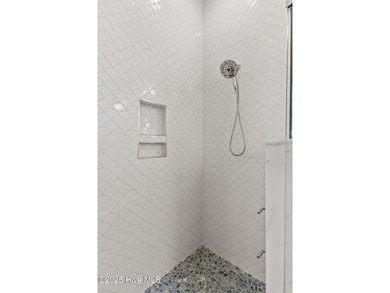 Experience the pinnacle of refined living in this newly