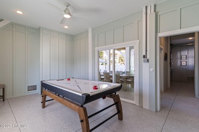 Experience the pinnacle of refined living in this newly