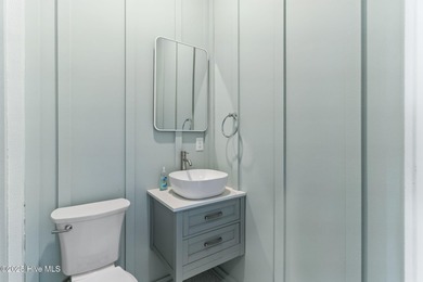 Experience the pinnacle of refined living in this newly