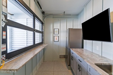 Experience the pinnacle of refined living in this newly