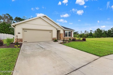 Step inside this beautifully maintained 2023-built home, where - photo 1