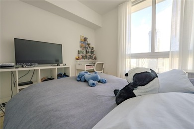 Exclusive 2 bedroom + den, 2 bathroom condo featuring