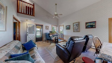 This charming home offers nearly 2,100 finished sq ft with two