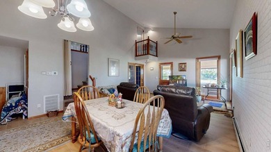 This charming home offers nearly 2,100 finished sq ft with two