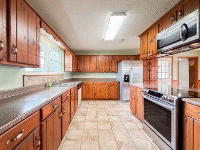Warm and inviting house nestled on 25.8 acres, this property - photo 10