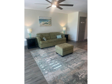 Charming condo featuring fabulous water views on one side and a