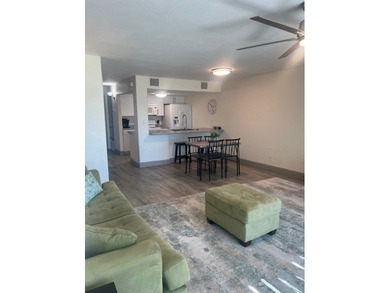 Charming condo featuring fabulous water views on one side and a