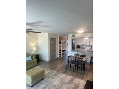 Charming condo featuring fabulous water views on one side and a