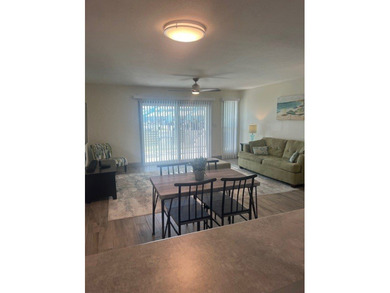 Charming condo featuring fabulous water views on one side and a